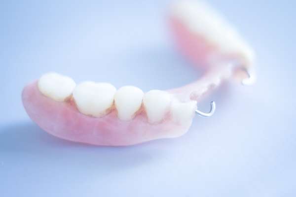 Should I Get Dentures or Dental Implants from Metcalf Dental in Oak Brook, IL